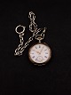 Silver pocket 
watch D.4.8 cm. 
with  chain the 
watch is 
running no. 
566868