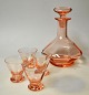 Viol decanter 
and 4 glasses, 
Holmegård, 
Denmark, 
design: Jacob 
E. Bang. Salmon 
colored glass. 
...