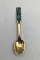 Georg Jensen 
Harlequin 
Sterling Silver 
Coffe Spoon 
Gilt with 
enamel
Measures 10 cm 
(3.93 inch)