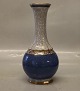 43-715 DJ Vase 
15,5 cm grey 
and gold with 
blue Dahl 
Jensen Marked 
with the Royal 
Crown and DJ 
...
