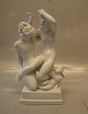1039 Faun & 
Nymph & Cupido 
(Blanc de 
chine)  29 cm 
(Poul Lemser)
 Dahl Jensen 
Marked with the 
...