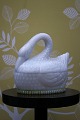 Rare, old swan 
in white glass. 
H: 14cm. L: 
15cm. 
Great for 
storing small 
items in the 
kitchen ...