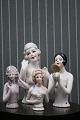 Fine, old 
porcelain half 
dolls.
Has been used 
as a top on old 
pincushions, 
but also just 
...