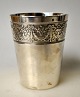 Silver cup, 
19th century. 
Stamped. 
Slightly smooth 
conical shape 
with decorative 
band on top. 
...