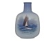 Royal 
Copenhagen vase 
with sailboat.
The factory 
mark tells, 
that this was 
produced in ...