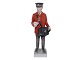 Large Royal 
Copenhagen 
figurine, 
postman in red 
uniform.
Factory first.
Height 30.0 
...