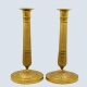 Pair of gold 
plated bronze 
candlesticks.
Decorated with 
peal twist, 
acanthus leaves 
and flowers. 
...