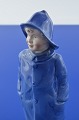 Bing & Grondahl 
porcelain 
figurine. B&G 
Boy with 
raincoat, no. 
2532. Height 18 
cm. 7 1/16 ...