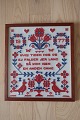 An old Sampler, 
handmade 
embroider, in 
the original 
frame
Text: "Hvis 
tiden hos os ej 
falder ...