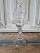 Baroque glass 
Chalk-shaped 
basin on a 
baluster-shaped 
stem, 
round 
bell-shaped 
foot with bent 
...