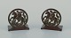 Just Andersen, 
Denmark. A pair 
of Art Deco 
bookends in 
"disko" metal 
featuring Saint 
George and ...