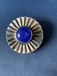Silver Brooch, 
Sterling with 
blue stones
Stamp: 925S 
E.DRAGSTED
Size: Ø 3.5 
cm.
Nice & ...