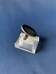 A lady's silver 
ring with black 
onyx, made in 
sterling 
silver,
a piece of 
jewelery that 
is both ...