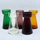 Collection of 
five tulip 
vases from 
Holmegaard 
around 1900. 
Consisting of 
the colours; 
clear, ...