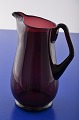 Holmegaard 
Glasworks. 
Beautiful 
purple pitcher  
height at 
handles 18.5 
cm.  1 liter. 
No chipping ...