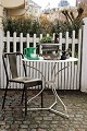 Fine, old 
French round 
garden / café 
table in white 
painted iron / 
metal. H: 77cm. 
Dia.: 80cm.