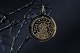 This pendant in 
8 carat gold is 
very special as 
there are 
motifs on both 
the front and 
back. The ...
