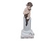 Royal 
Copenhagen 
figurine, Faun 
sitting on a 
pedestal with a 
rabbit on base.
Decoration ...