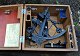 Russian sextant 
in a wooden 
case with 
various lenses, 
20th century 
Russia. 
Dimensions of 
the ...