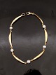 14 carat gold 
bracelet 21 cm. 
with genius 
pearls item no. 
577854
