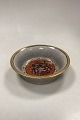 Dahl Jensen 
Cracked Bowl 
No. 129/490. 
Decoration in 
siena red, 
white and gold. 
Slight wear on 
...