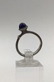 Ole Lynggaard 
Sterling Silver 
Lotus Ring 
(Lapis Lazuli) 
Measures Ring 
Str. 52 (US 6) 
Weight 3 gr ...