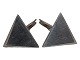 N.E. From 
Danish sterling 
silver, pair of 
triangular 
cufflinks from 
around 1950 to 
1960. These ...