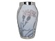 Royal 
Copenhagen Art 
Nouveau vase 
with silver 
mounting.
The factory 
mark tells, 
that this was 
...