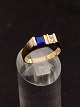 14 carat gold 
ring size 62 
with 2 small 
clear and one 
large sapphire 
colored stone 
item no. 579489