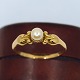Georg Jensen 
gold jewellery.
Georg Jensen; 
A ring
made of 18k 
gold,
set with 
pearl. From ...
