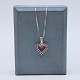 Henrik Solskov; 
A necklace in 
14k white gold 
set with a 
heart shaped 
ruby pendant. 
Rubies ...