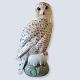 Royal 
Copenhagen; A 
porcelain 
figurine, a 
snowy owl 
#1829. Second 
(light spot on 
the right wing 
...