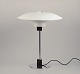 Poul Henningsen 
for Louis 
Poulsen, 4/3 
table lamp with 
white metal 
shades.
Early model 
from the ...