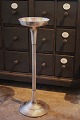 Old French 
metal stand 
with room for a 
champagne 
cooler/bucket 
at the top.
The champagne 
stand ...