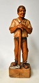 Unknown artist 
(20th century): 
A working man. 
Carved painted 
wooden 
sculpture. Pine 
tree. ...