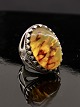 Sterling silver 
ring size 56-57 
with amber 2.7 
x 1.8 cm. Item 
No. 590908