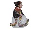 Royal 
Copenhagen 
Overglaze 
Figurine, girl 
from Amager.
Decoration 
number 12412.
Factory ...