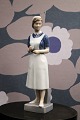 Royal 
Copenhagen 
porcelain 
figure of 
nurse.
H: 21.5cm. 
Decoration 
number: 4507. 
1st ...