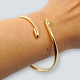 Carl Antonsen; 
Bangle in 14k 
solid gold. 
From around 
1980-90.
Internal dia. 
6.4 cm.
Stamped ...