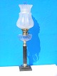 Old paraffin 
lamp with black 
marmor foot. 
Fine old glass 
globe. Height 
68cms. From 
1880