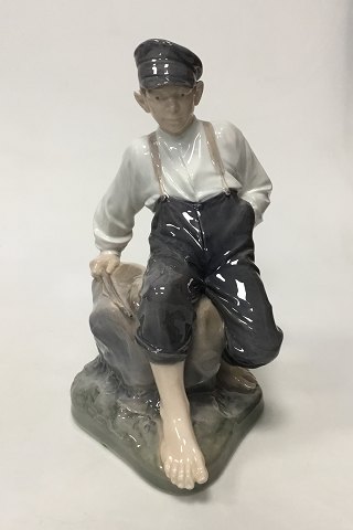 Royal Copenhagen Figurine Boy on Rock No 1659