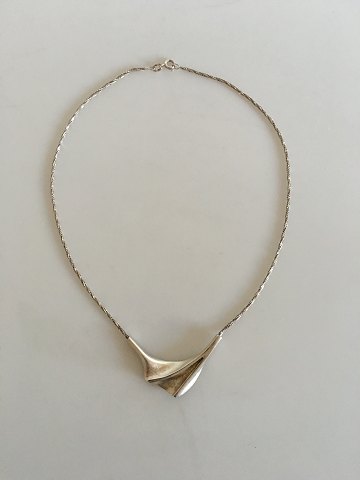 N. E. From Sterling Silver pendant with chain