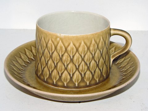 Relief
Tea cup with saucer