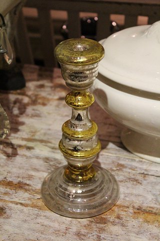 Old candlestick in mercury glass with fine, a little worn patina. Height: 
21.5cm.