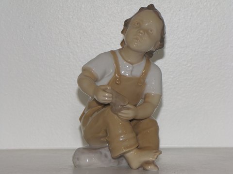 Bing & Grondahl figurine
Boy holding shoe