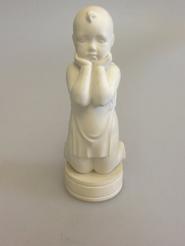 Royal Copenhagen Figurine of a boy No 1930 Arno Malinowski.