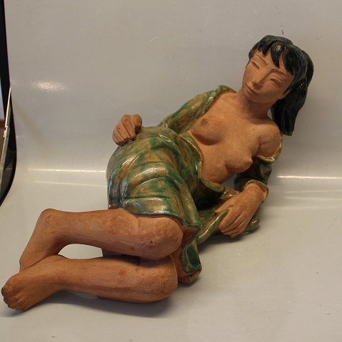 Copenhagen Art Pottery Helge Christoffersen Woman laying 25 x 50 cm chamotte og 
green glaze