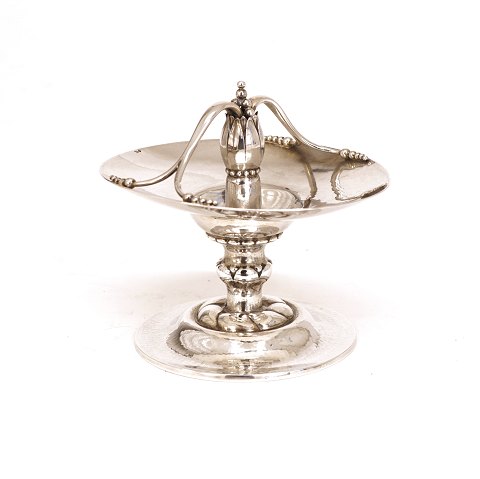 Georg Jensen: Small Blossom silver tray. 1915-27. 
H: 10,7cm. Tray: 12,5x10cm. W: 210gr