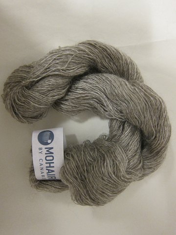 Kidmohair - 1-ply
Kidmohair is a natural product of a very high quality from the angora goat from 
South Africa
The colour shown is: Medium brownmixed, Colourno 1305
1 ball of wool containing 50 grams