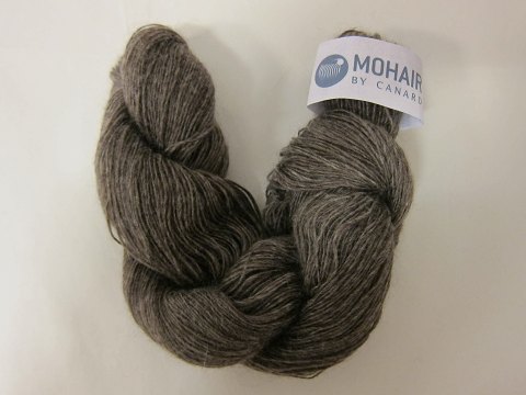 Kidmohair - 1-ply
Kidmohair is a natural product of a very high quality from the angora goat from 
South Africa
The colour shown is: Dark brownmixed, Colourno 1329
1 ball of wool containing 50 grams